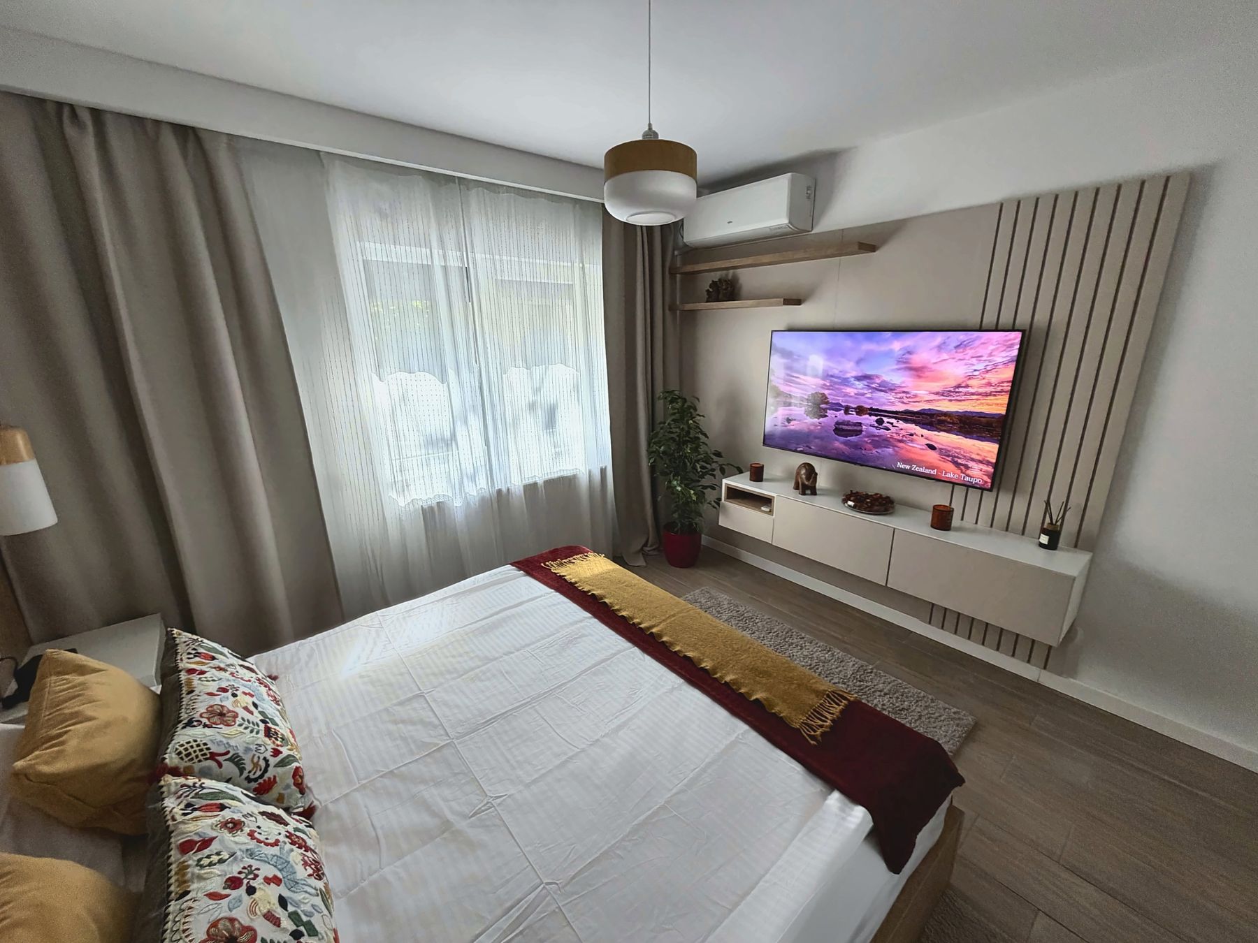 The bedroom, with TV