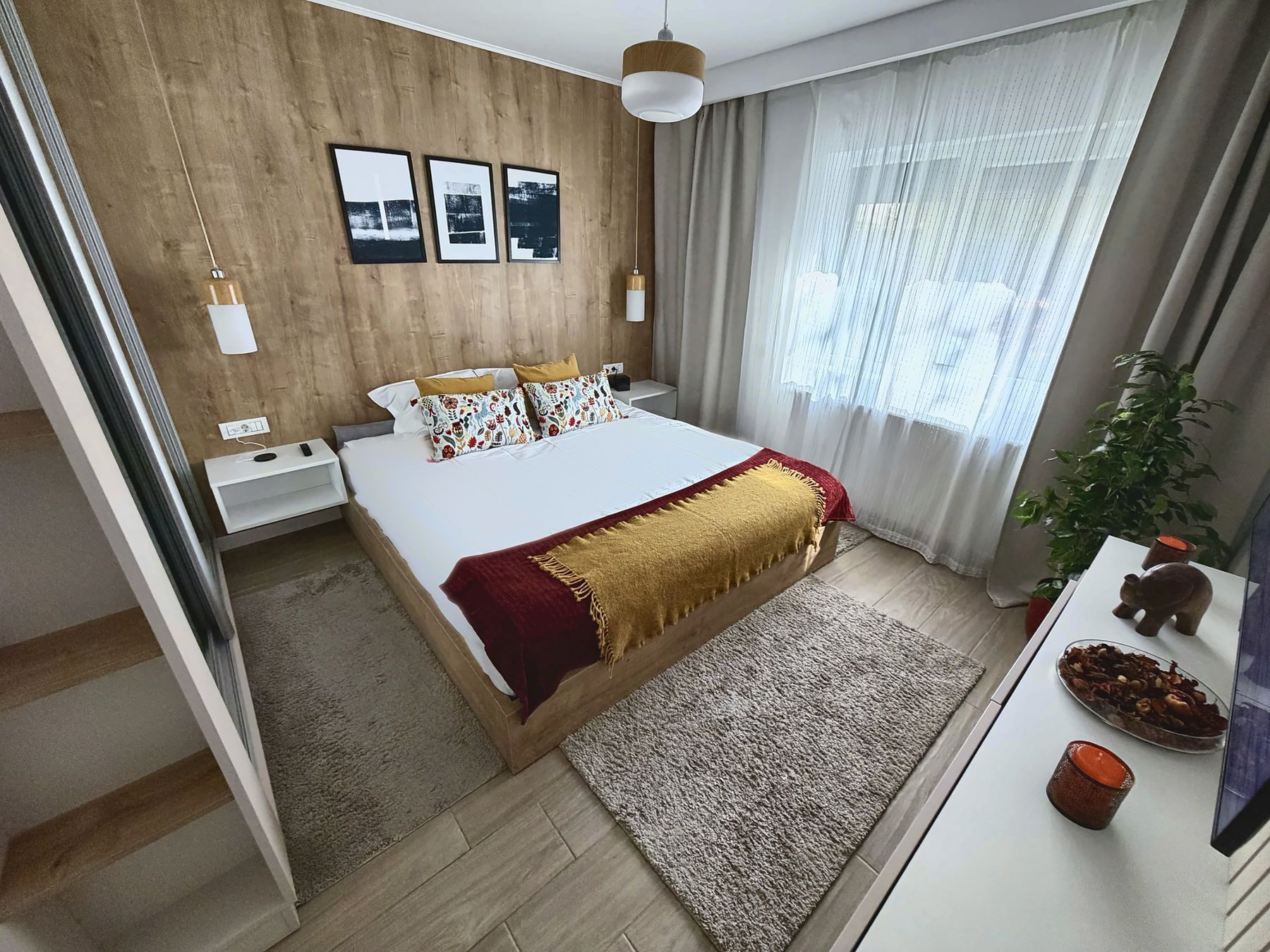 The bedroom with a king-size bed