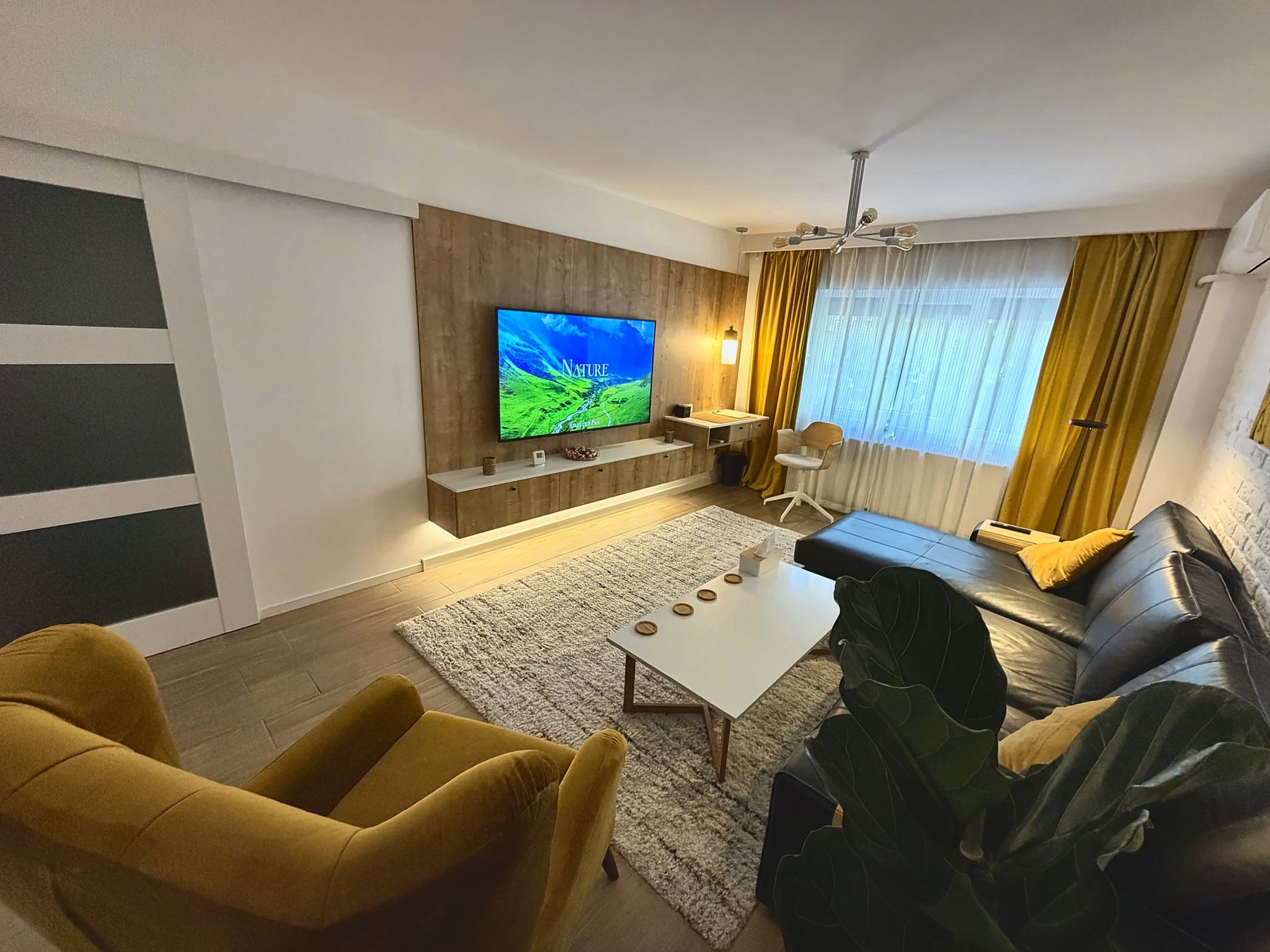 Living room with TV and lounge area